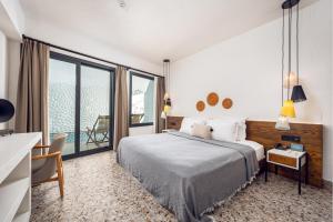 Postel nebo postele na pokoji v ubytování Ölüdeniz Blu Luxury Unique Hotel - Adults-Only