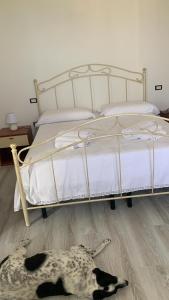 Postel nebo postele na pokoji v ubytování La casa di Carolina