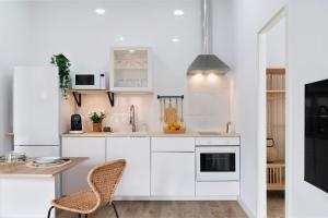 Η κουζίνα ή μικρή κουζίνα στο Calma Muralla House-Two bedrooms & two bathrooms +10 φωτογραφίες