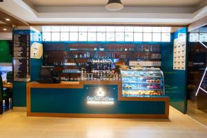 a store with a counter in a store at HOTEL THE CAPITAL LTD. in Dhaka