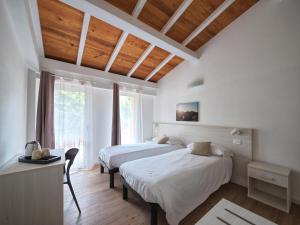 Postel nebo postele na pokoji v ubytování Agriturismo Zè del Pino + 28 fotografií
