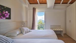 Postel nebo postele na pokoji v ubytování Agriturismo Zè del Pino