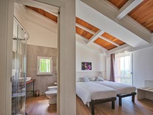 Postel nebo postele na pokoji v ubytování Agriturismo Zè del Pino