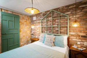 En eller flere senge i et værelse på Terra Apart