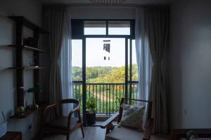 Posezení v ubytování Rustic Haven Lakeside Condo in Entebbe