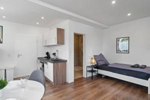 Posezení v ubytování RO01 Schickes 1-Zimmer Apartment