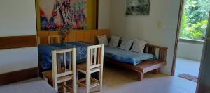Postel nebo postele na pokoji v ubytování C-VIEW BOUTIQUE + 16 fotografií