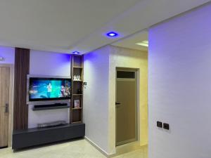 TV/trung tâm giải trí tại Appartement de luxe