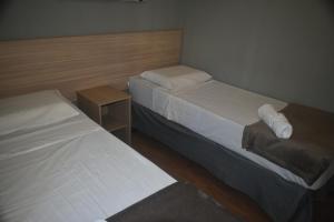 Llit o llits en una habitació de Unity Hotel - Vila Mariana SP