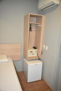 Llit o llits en una habitació de Unity Hotel - Vila Mariana SP