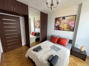Posteľ alebo postele v izbe v ubytovaní Apartament Elegant Kiprów