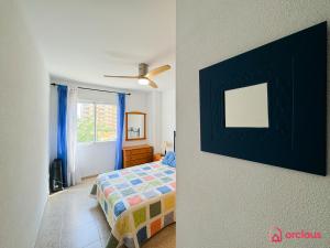 Postel nebo postele na pokoji v ubytování Cala Concha