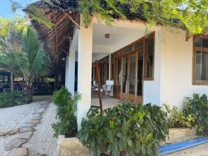 Zahrada ubytování Palafitta Zanzibar