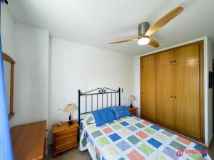 Postel nebo postele na pokoji v ubytování Cala Concha