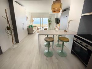 A kitchen or kitchenette at CS7 Kaleria Suites