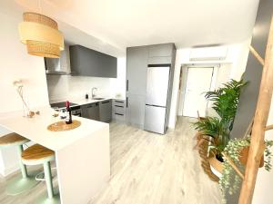A kitchen or kitchenette at CS7 Kaleria Suites