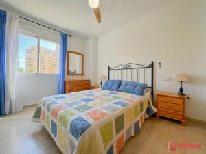 Postel nebo postele na pokoji v ubytování Cala Concha