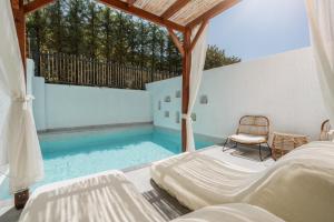 Bazén v ubytování Ölüdeniz Blu Luxury Unique Hotel - Adults-Only nebo v jeho okolí