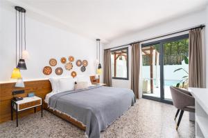 Postel nebo postele na pokoji v ubytování Ölüdeniz Blu Luxury Unique Hotel - Adults-Only