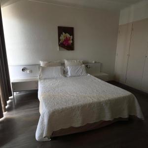 Postel nebo postele na pokoji v ubytování Sun Beach