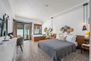 Postel nebo postele na pokoji v ubytování Ölüdeniz Blu Luxury Unique Hotel - Adults-Only