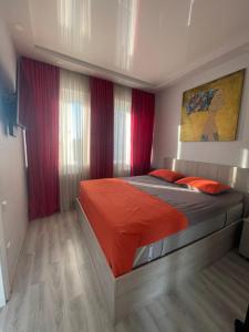 Postel nebo postele na pokoji v ubytování Nick Appartment Batumi