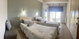 Posteľ alebo postele v izbe v ubytovaní Renting House GALINI