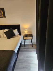 Ένα ή περισσότερα κρεβάτια σε δωμάτιο στο Liverpool modern family living +2 φωτογραφίες