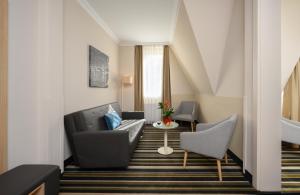 Χώρος καθιστικού στο Leonardo Hotel Budapest