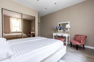 Katil atau katil-katil dalam bilik di Rose Old Town Apartment