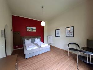 Postel nebo postele na pokoji v ubytování Hostel Goslar