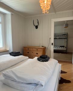 Letto o letti in una camera di Alpine Haus