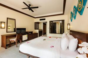 TV a/nebo společenská místnost v ubytování Nang Thong Bay Resort