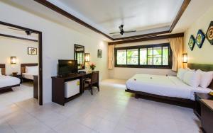 Postel nebo postele na pokoji v ubytování Nang Thong Bay Resort