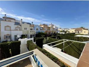 una vista desde el balcón de una casa en Beautiful Chalet Adosado con piscina comunitaria, en Denia