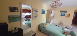 Postel nebo postele na pokoji v ubytování Galini apartments Kriopigi
