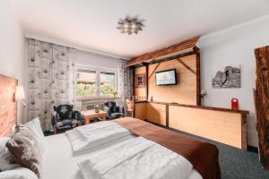 Postel nebo postele na pokoji v ubytování Hotel Alpensonne + 30 fotografií