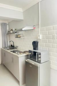 Kuchyň nebo kuchyňský kout v ubytování Private Pelican Corner