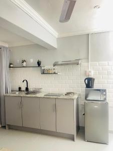 Kuchyň nebo kuchyňský kout v ubytování Private Pelican Corner