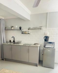 Kuchyň nebo kuchyňský kout v ubytování Private Pelican Corner