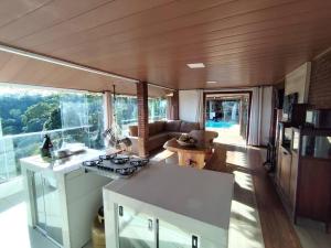 Χώρος καθιστικού στο Casa em Domingos Martins