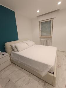 Postel nebo postele na pokoji v ubytování Blumoon boutique