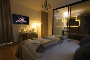 Garden Luxury Rooms客房内的一张或多张床位