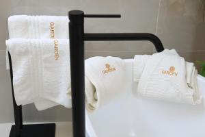 Garden Luxury Rooms客房内的一张或多张床位