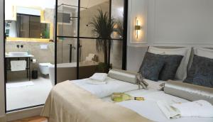 Garden Luxury Rooms客房内的一张或多张床位