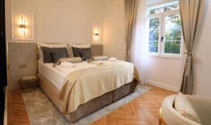 Garden Luxury Rooms客房内的一张或多张床位
