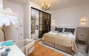 Garden Luxury Rooms客房内的一张或多张床位
