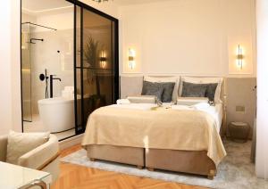 Garden Luxury Rooms客房内的一张或多张床位