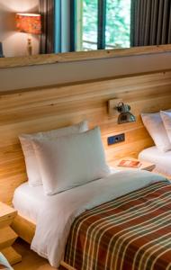Letto o letti in una camera di 1740 Boutique Hotel Kazbegi