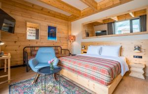 Letto o letti in una camera di 1740 Boutique Hotel Kazbegi